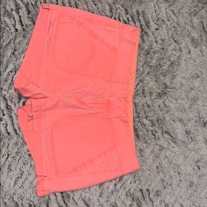Peach shorts.